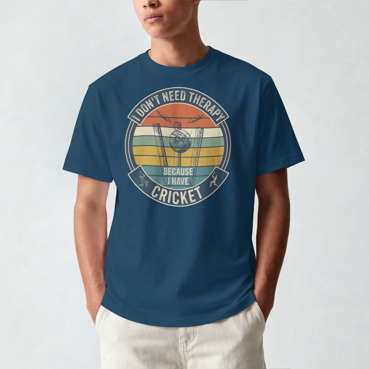 Navy Blue vintage cricket t-shirt featuring the slogan “I Don’t Need Therapy Because I Have Cricket” with retro sunset stripes, cricket stumps, bat, and ball graphic.