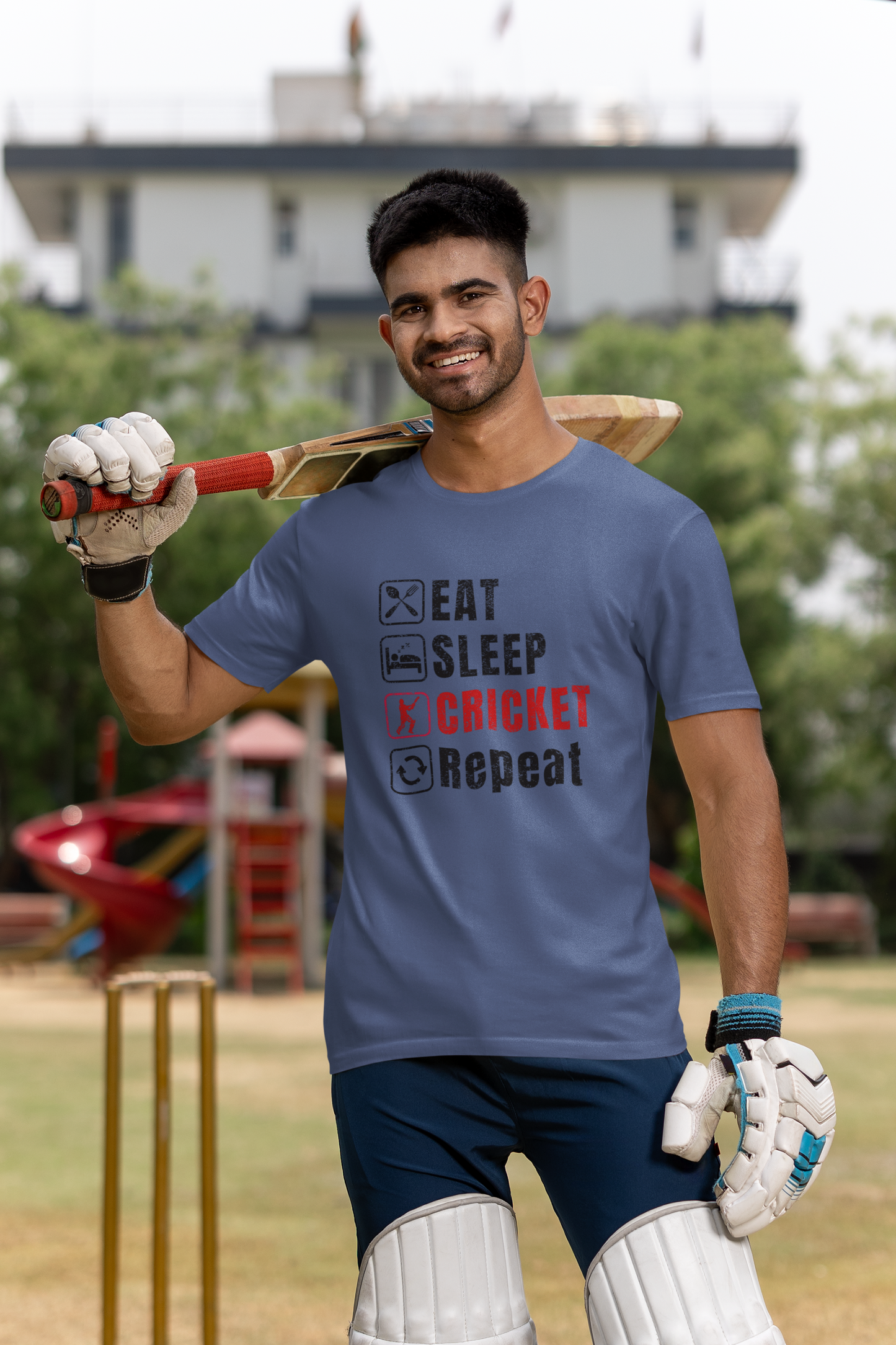 Smoke Blue Graphic tee featuring Eat Sleep Cricket Repeat slogan, ideal for Indian cricket enthusiasts