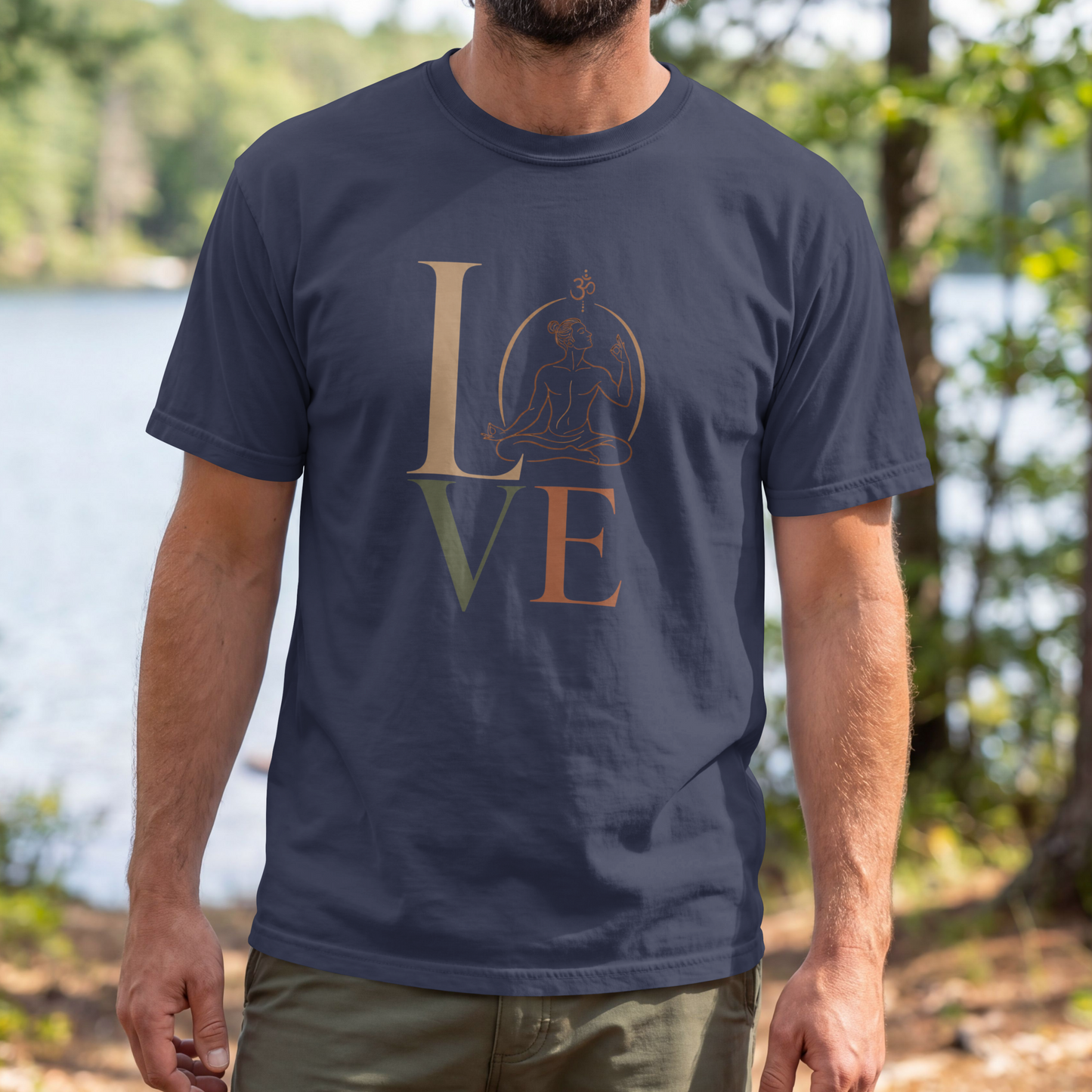 A man modelling a navy blue graphic t-shirt featuring a minimalist "LOVE" design with a meditating yoga pose and an Om symbol