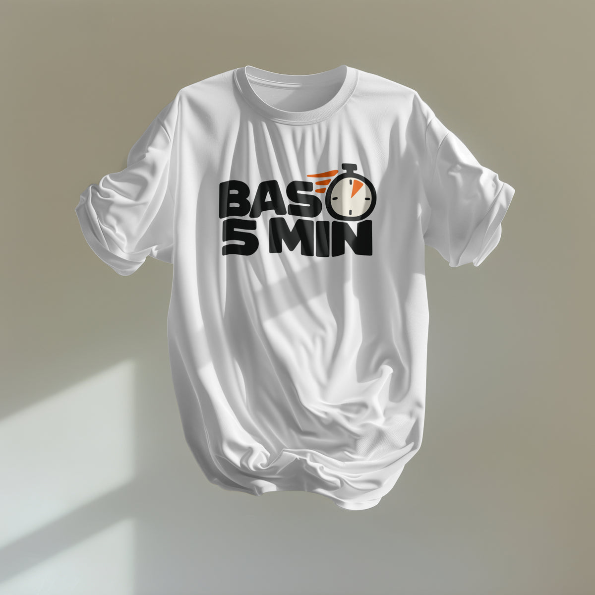 White Bas 5 Min oversized tee shown front-on, bold black text with a stopwatch in place of the letter O