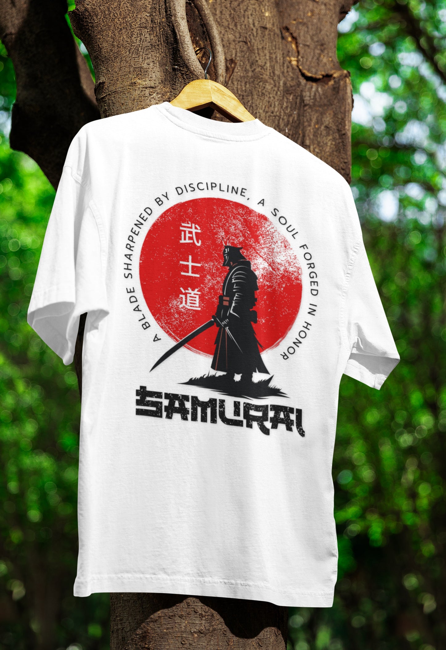 Flat lay of Nauma Bushido Discipline white oversized T-shirt with samurai graphic