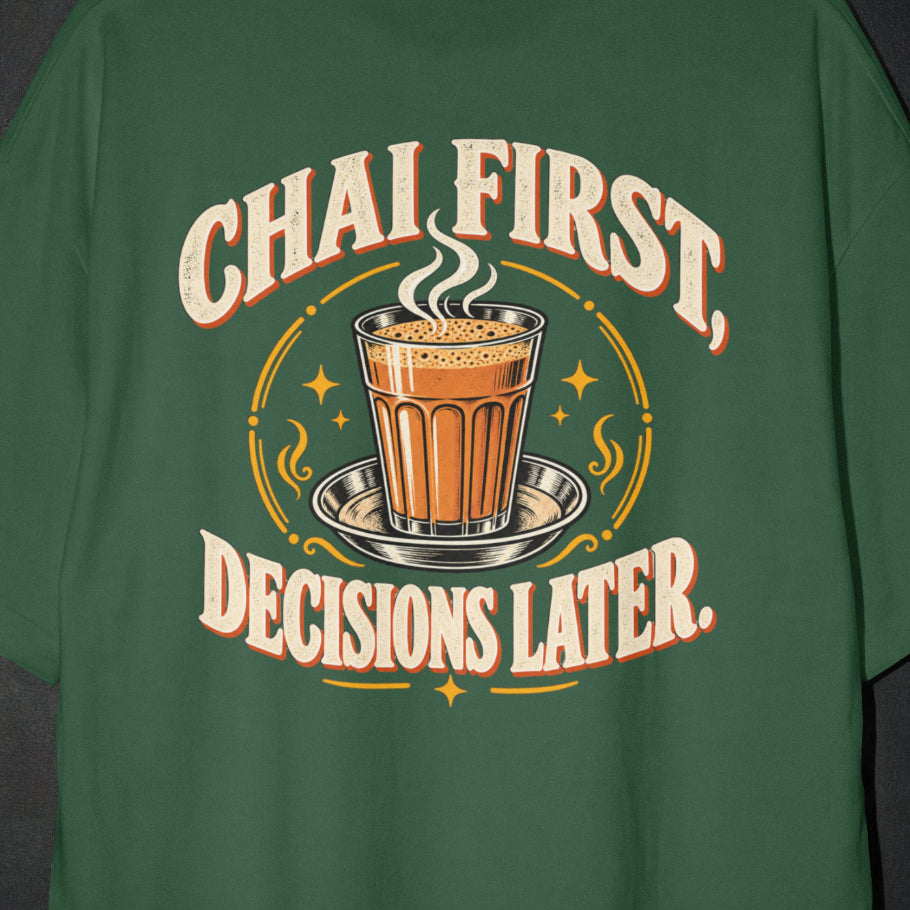 Bottle Green Chai First Decisions Later T-shirt print close-up: cream retro lettering around a steaming cutting chai glass on a steel saucer