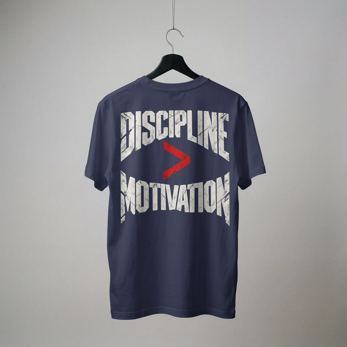 Navy Blue Discipline Over Motivation oversized t-shirt on a hanger, showing the back print