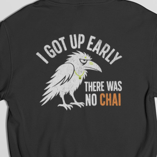 Close-up of white crow and I got up early there was no chai back print on Black hoodie