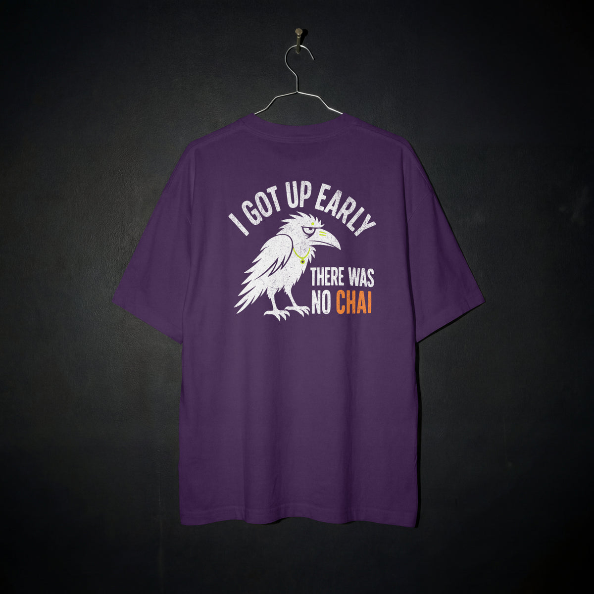 Purple Early Bird No Chai funny chai oversized t-shirt flat on a hanger