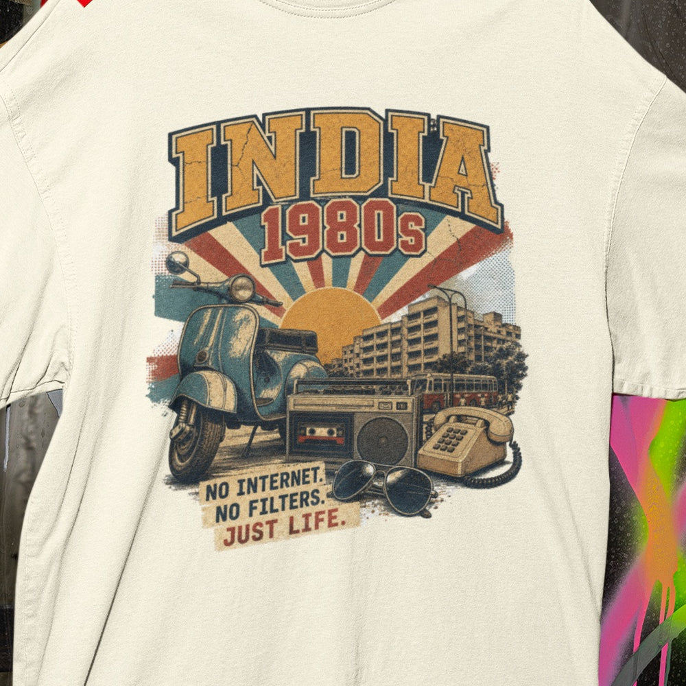 Close-up of the INDIA 1980s print on the Off white oversized t-shirt – vintage scooter, cassette player, rotary phone and No Internet No Filters Just Life slogan