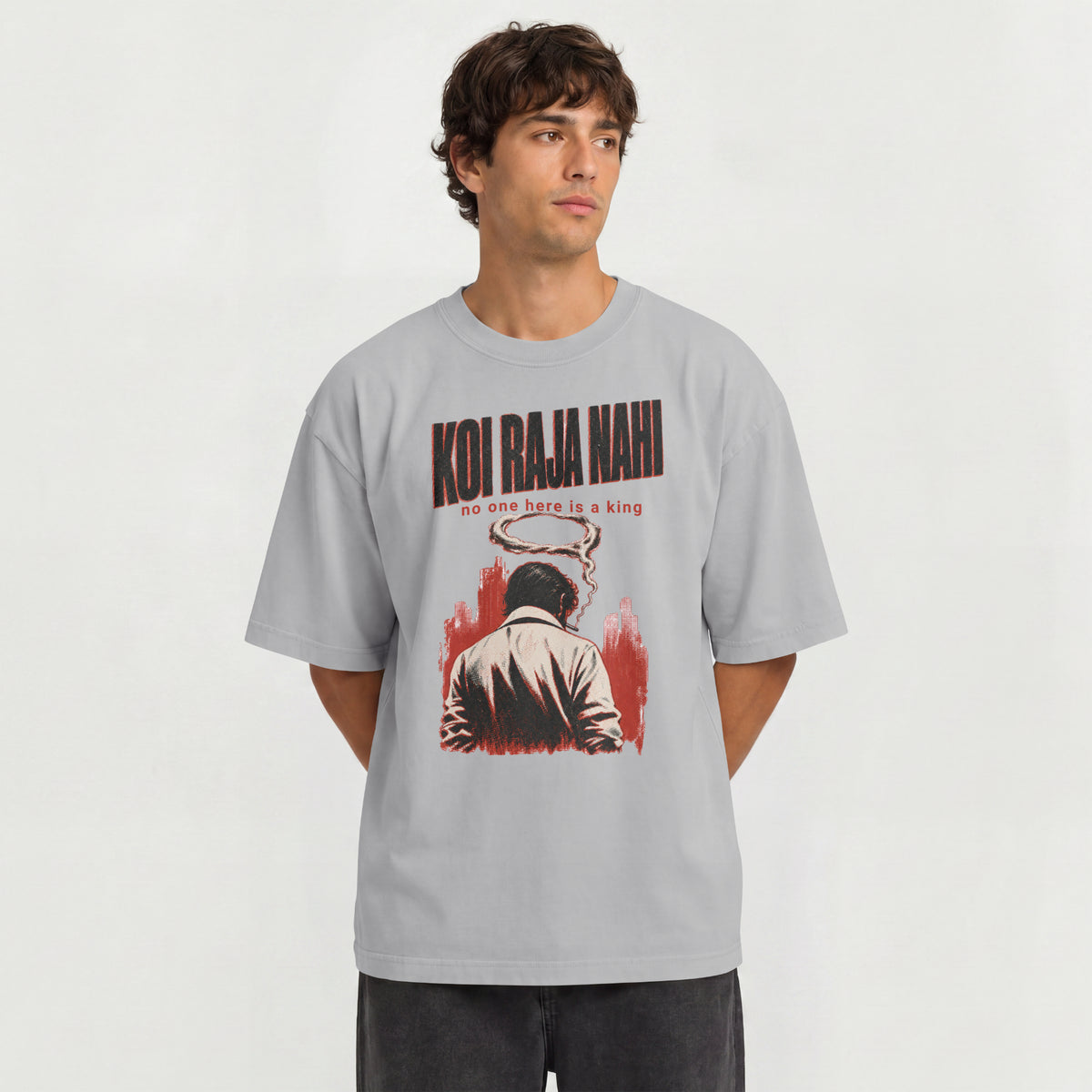 Man wearing the melange grey Koi Raja Nahi oversized graphic t-shirt