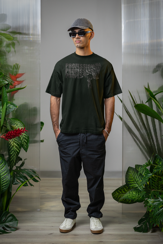 Man wearing a bottle green t-shirt with text professional cricket