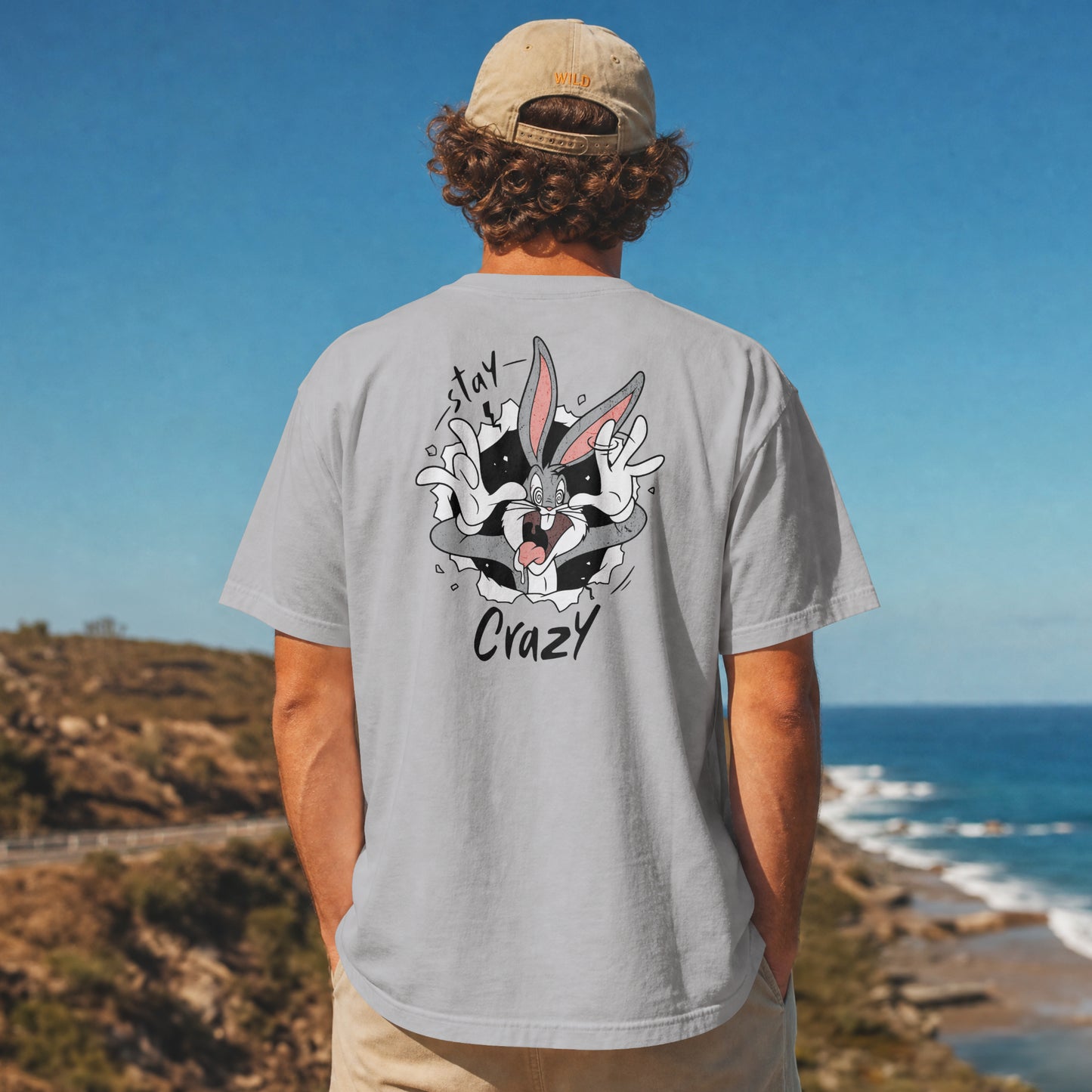 Melange Grey oversized unisex t-shirt with a Stay Crazy Bugs Bunny graphic breaking through the fabric, back view