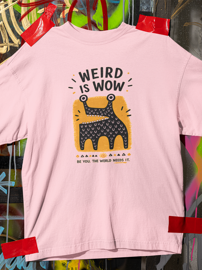 Light baby pink oversized unisex graphic tee with cute Weird Is Wow artwork