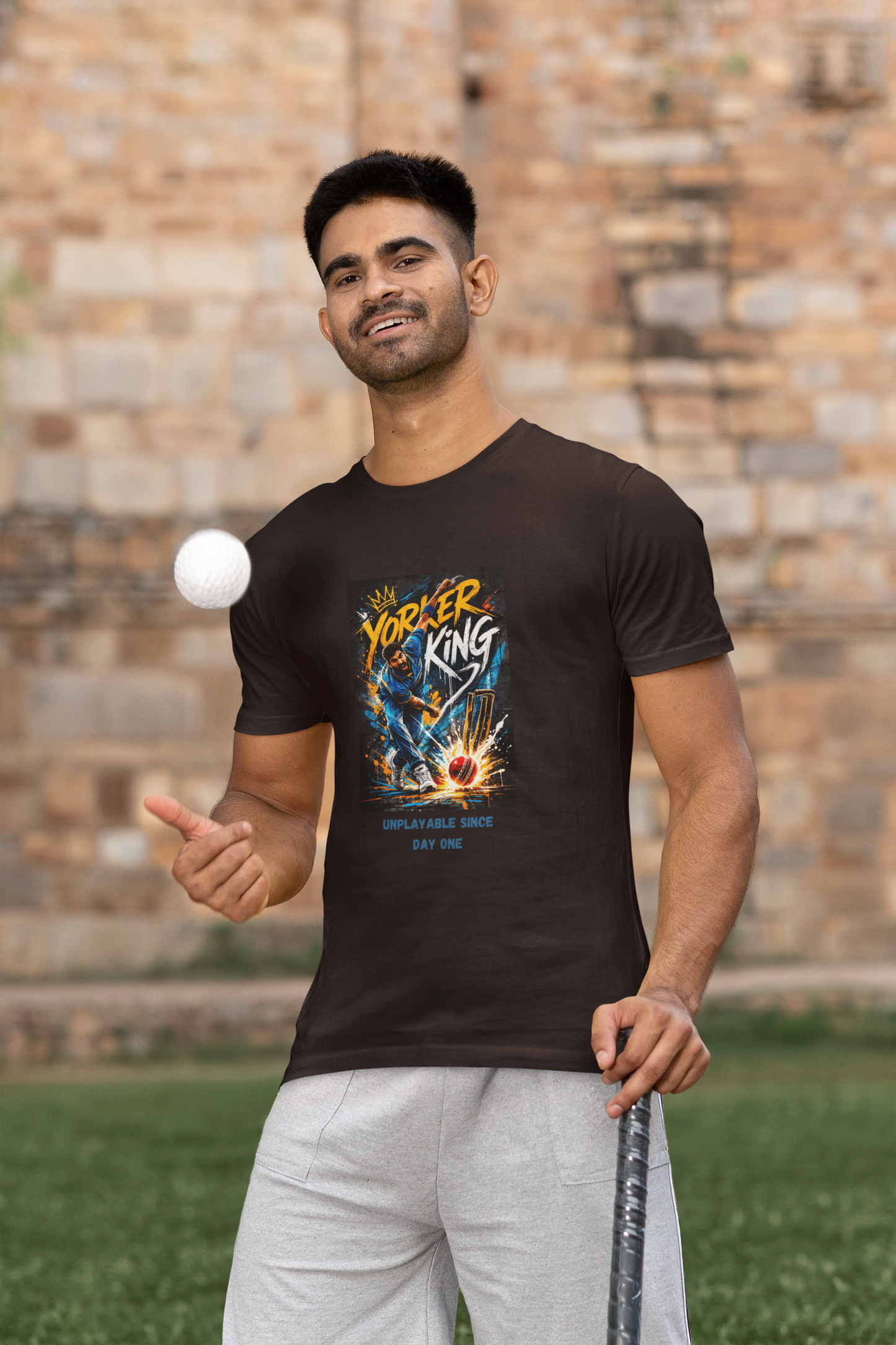 Coffee Brown Yorker King cricket bowler graphic t-shirt unplayable since day one design