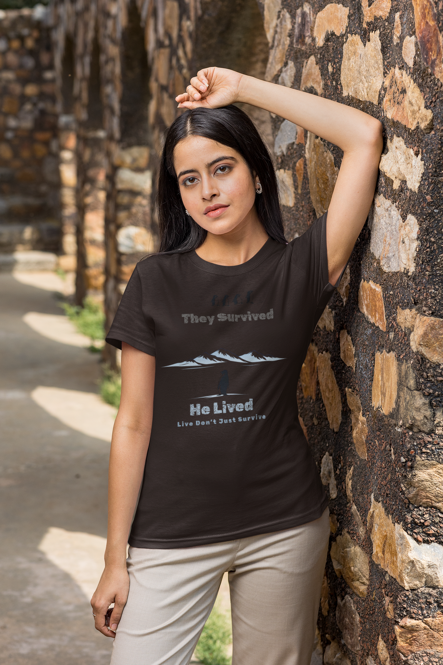 Coffee Brown Minimalist penguin design with inspirational quote “They survived. He lived.” t-shirt style graphic.
