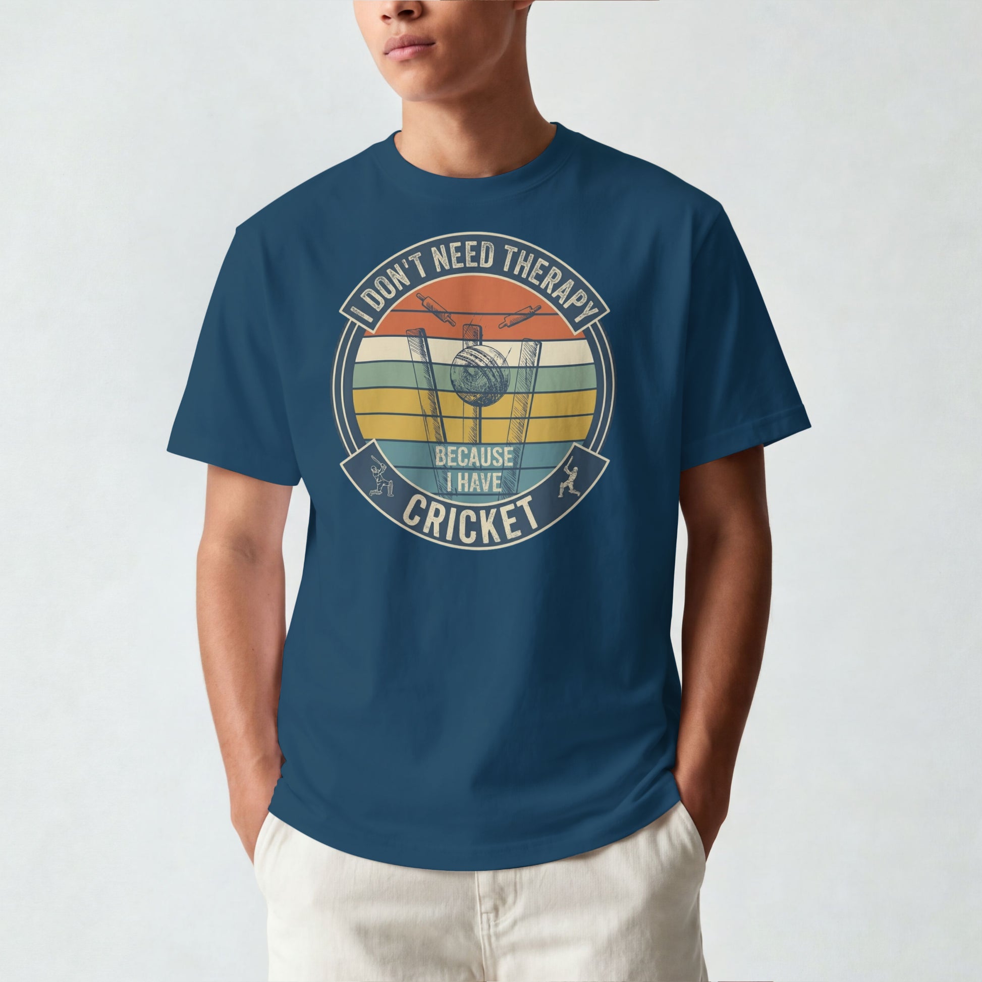 Navy Blue vintage cricket t-shirt featuring the slogan “I Don’t Need Therapy Because I Have Cricket” with retro sunset stripes, cricket stumps, bat, and ball graphic.