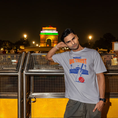 Silver Frost In Cricket We Trust oversized t-shirt design with cricket bat, ball and stadium graphic