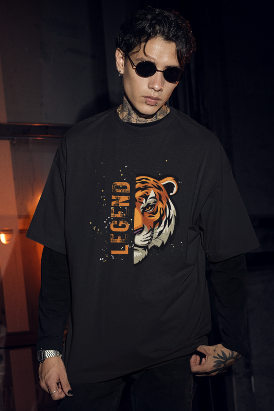 Black oversized unisex cotton t-shirt featuring a bold half tiger face graphic with LEGEND typography in streetwear style.