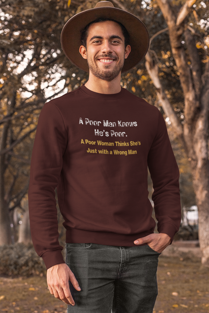Man wearing a maroon sweatshirt with humorous text in an outdoor setting