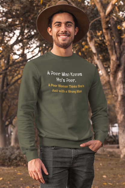 Man wearing a olive green sweatshirt with humorous text in an outdoor setting