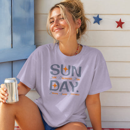 Lavender unisex oversized t-shirt featuring 'Sunday Seek Unlimited New Day' graphic print, front view.