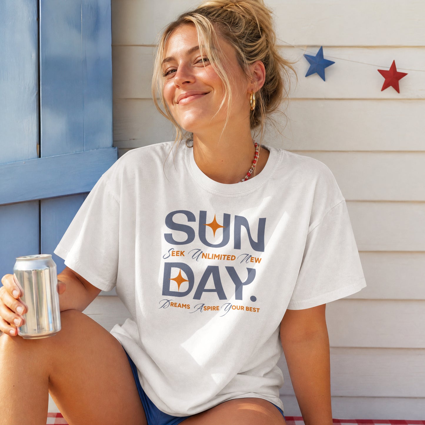 White unisex oversized t-shirt featuring 'Sunday Seek Unlimited New Day' graphic print, front view.