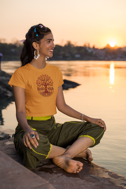 Golden Yellow women’s crop top with Rooted in Yoga tree graphic print