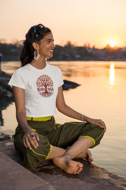 White women’s crop top with Rooted in Yoga tree graphic print