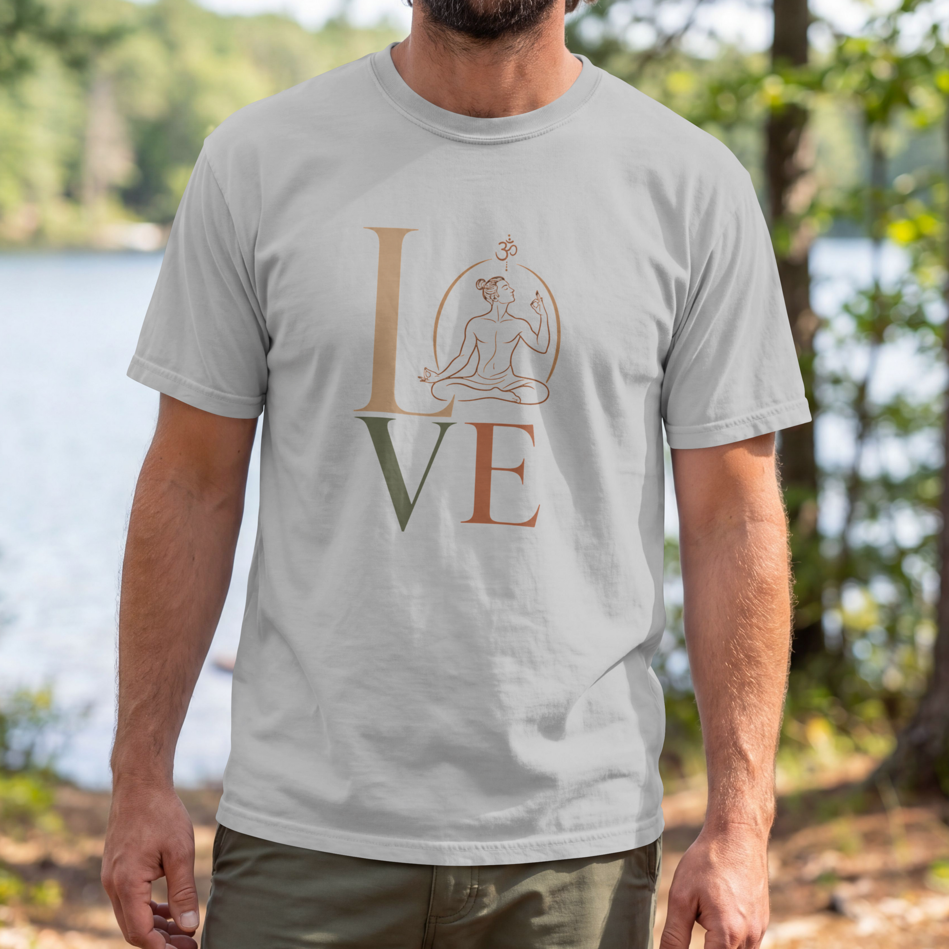A man modelling a grey melange graphic t-shirt featuring a minimalist "LOVE" design with a meditating yoga pose and an Om symbol