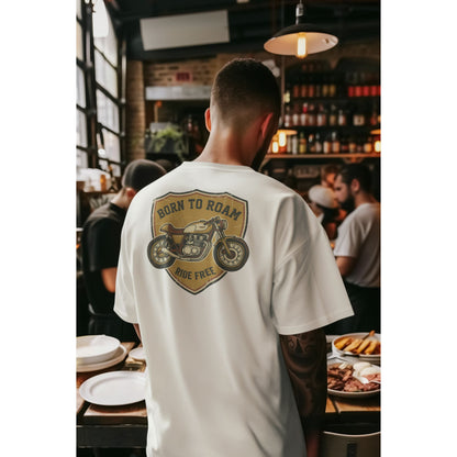 Male model wearing the Nauma Born To Roam cafe racer oversized t-shirt in White, boxy unisex fit