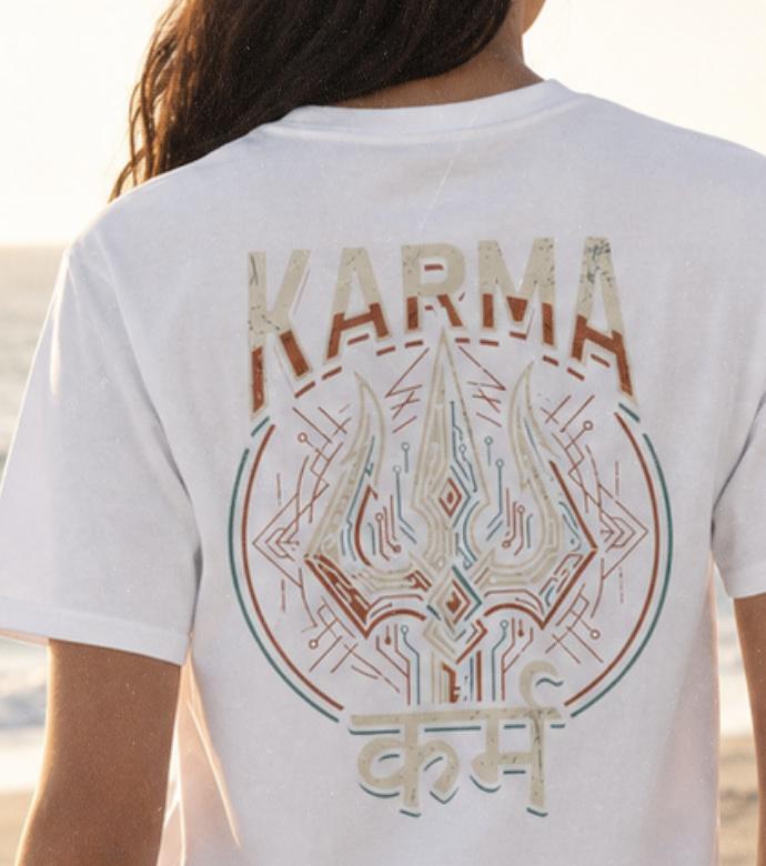 Close-up of Karma trishul graphic print on White oversized t-shir