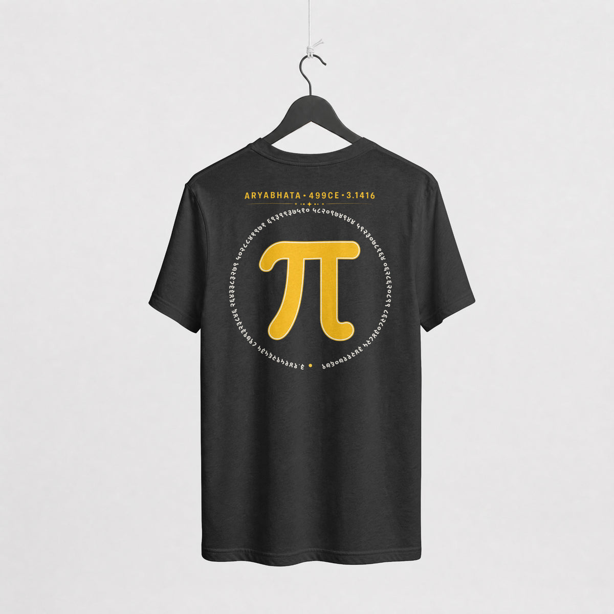 Black Aryabhata Pi oversized t-shirt on a hanger, back view with mustard pi symbol and ARYABHATA 499CE 3.1416 print