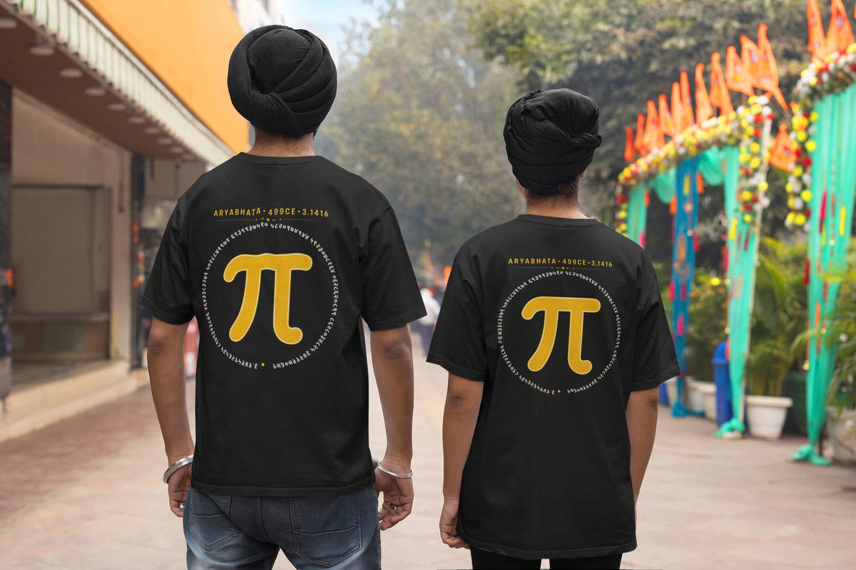 Black Aryabhata Pi oversized t-shirt, back view worn by two men on a festive street showing the mustard pi back print