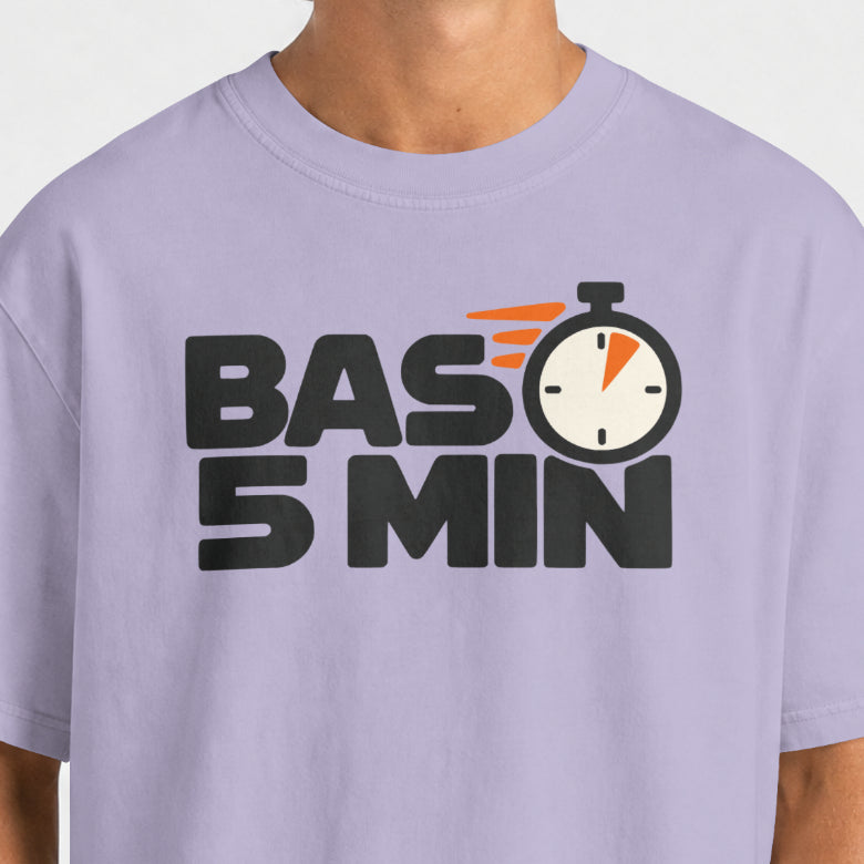 Lavender Bas 5 Min chest print up close, black block letters and stopwatch with orange accents