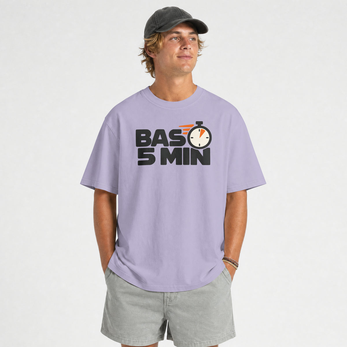 Lavender Bas 5 Min unisex oversized t-shirt on a male model in a cap, relaxed drop-shoulder fit