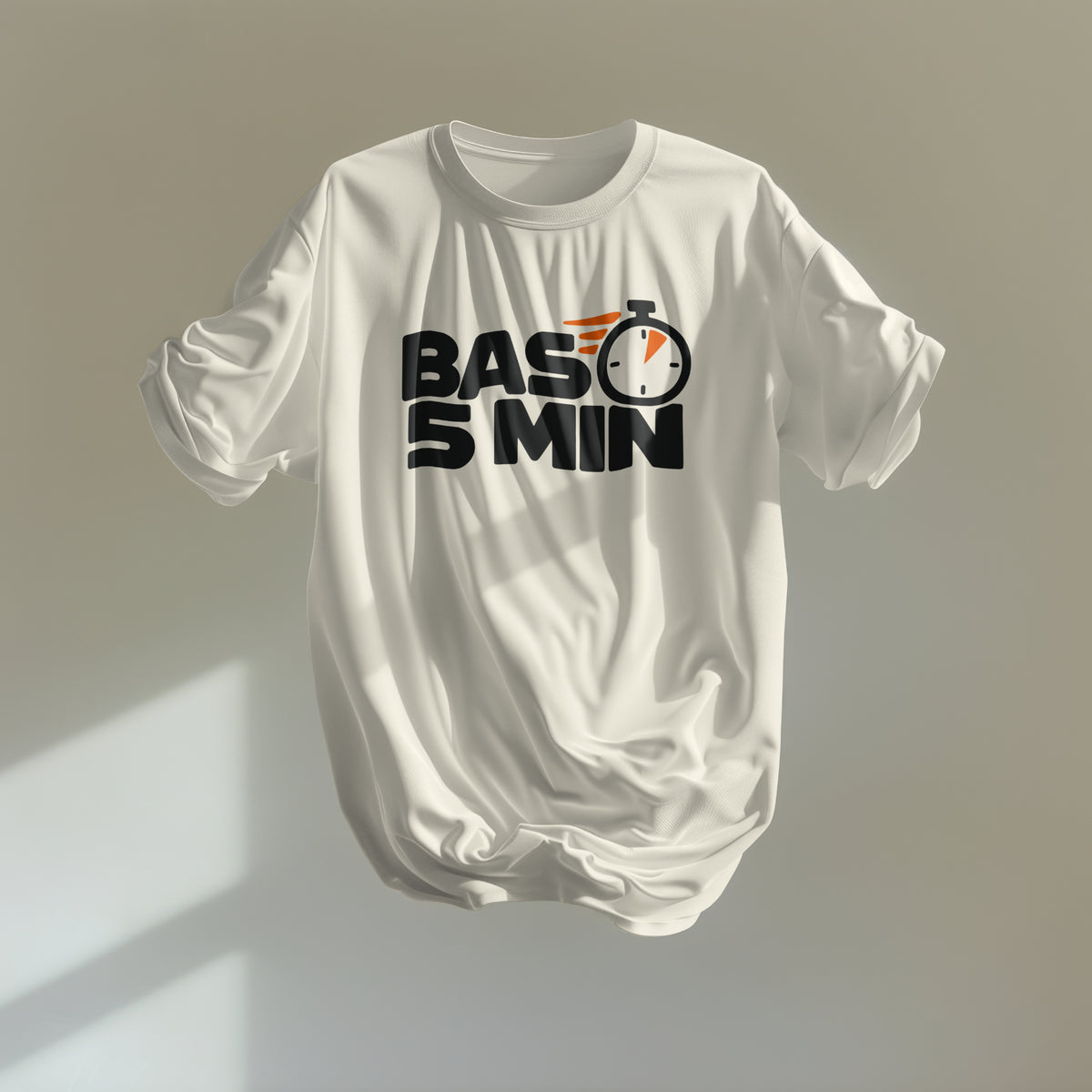 Off White Bas 5 Min oversized t-shirt floating against a sunlit wall, black lettering with an orange-accented stopwatch