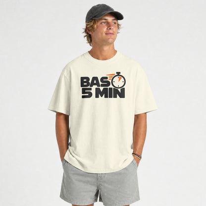 Off White Bas 5 Min unisex oversized t-shirt on a male model with grey shorts, stopwatch print on the chest