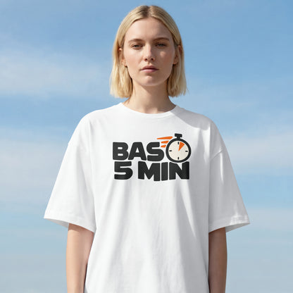 White Bas 5 Min funny Hinglish oversized tee on a female model, relaxed drop-shoulder fit, blue sky behind