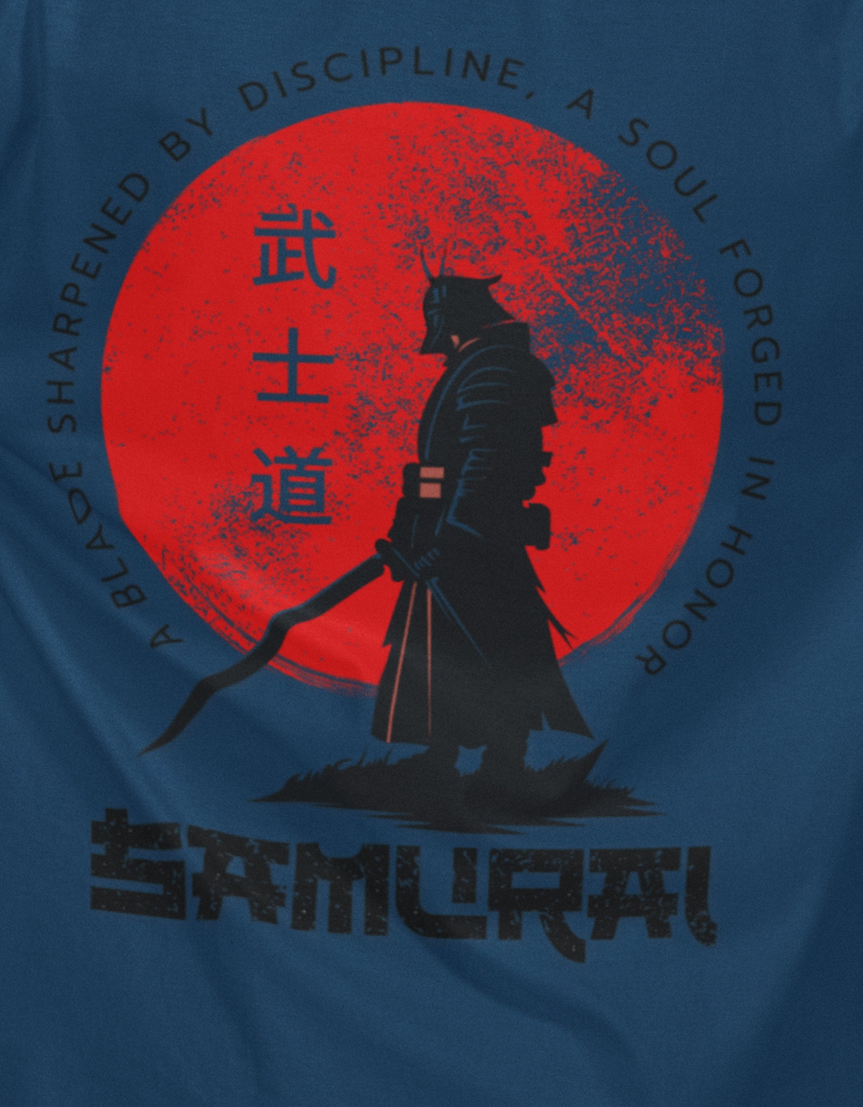 Close-up of samurai silhouette and red sun print on Nauma navy blue oversized T-shirt