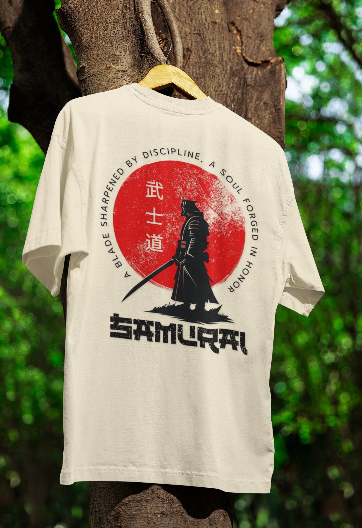 Flat lay of Nauma Bushido Discipline off white oversized T-shirt with samurai graphic