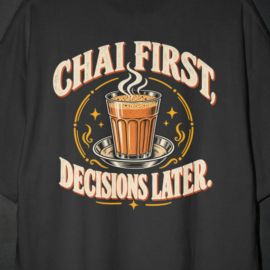 Black Chai First Decisions Later T-shirt print close-up: cream retro lettering around a steaming cutting chai glass on a steel saucer