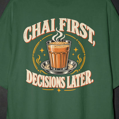 Bottle Green Chai First Decisions Later T-shirt print close-up: cream retro lettering around a steaming cutting chai glass on a steel saucer