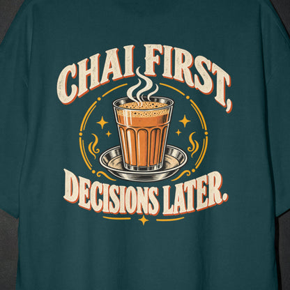 Petrol Blue Chai First Decisions Later T-shirt print close-up: cream retro lettering around a steaming cutting chai glass on a steel saucer