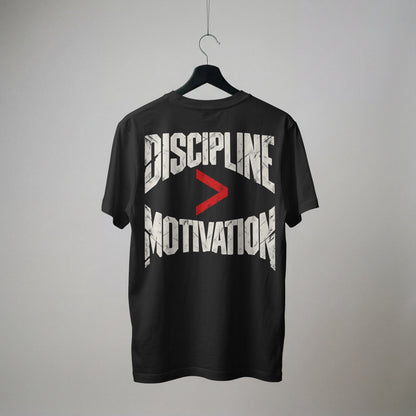 Black Discipline Over Motivation oversized t-shirt on a hanger, showing the back print