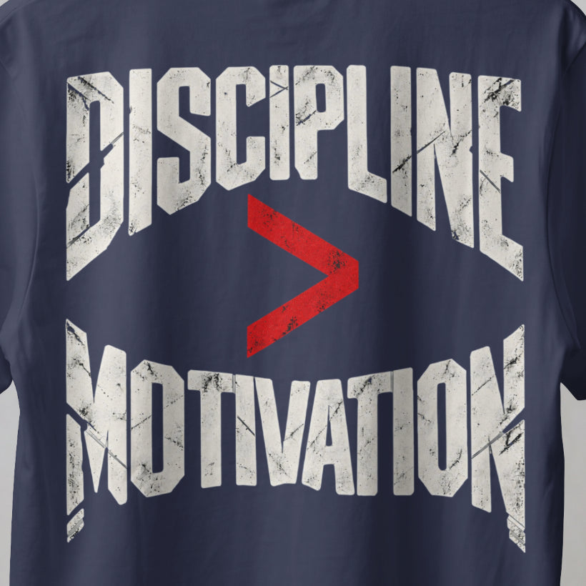 Navy Blue Discipline Over Motivation back print close-up, cracked off-white letters with a red greater-than sign