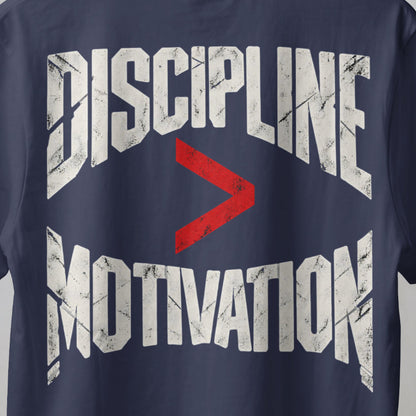 Navy Blue Discipline Over Motivation back print close-up, cracked off-white letters with a red greater-than sign