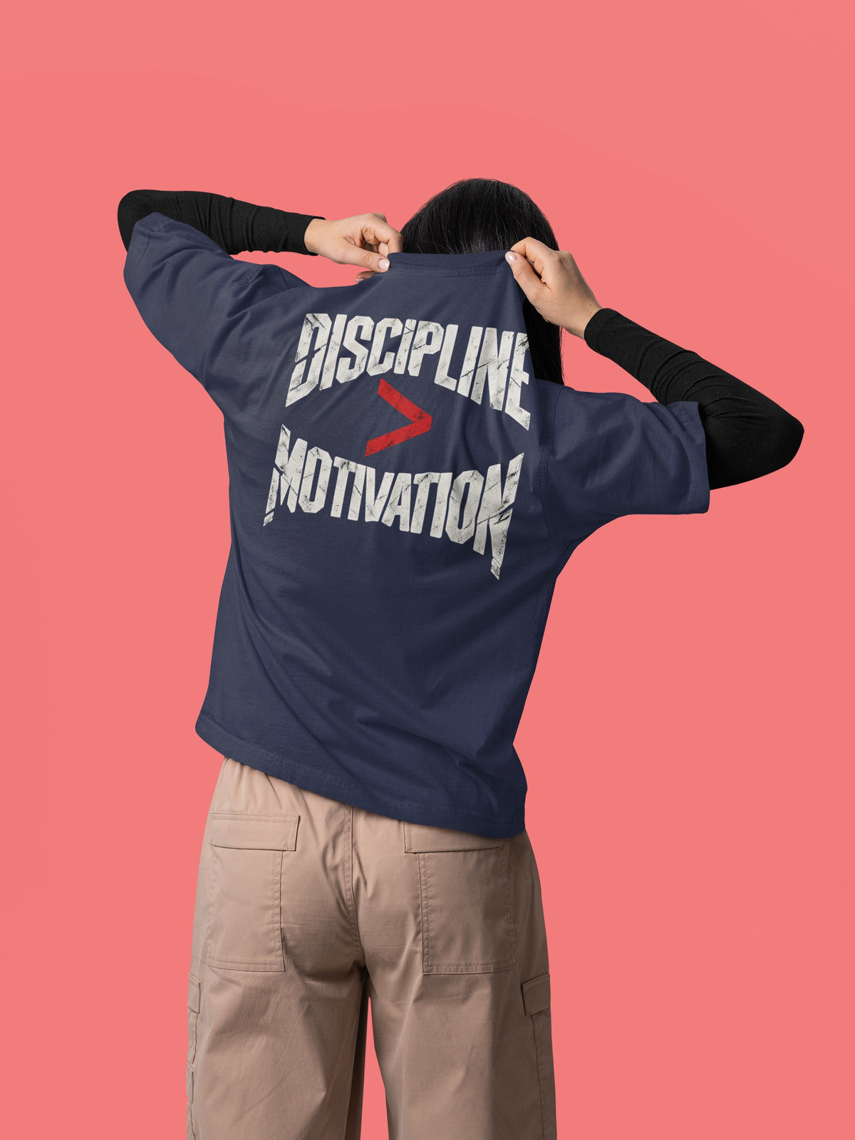 Navy Blue Discipline Over Motivation back print unisex oversized t-shirt worn by a woman, back view