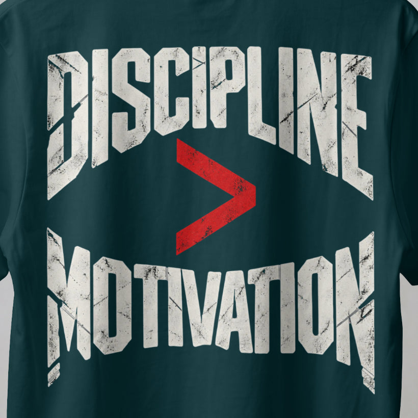 Petrol Blue Discipline Over Motivation back print close-up, cracked off-white letters with a red greater-than sign