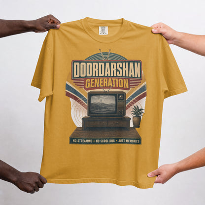 Mustard Yellow Doordarshan Generation oversized t-shirt held up flat to show the full retro TV print