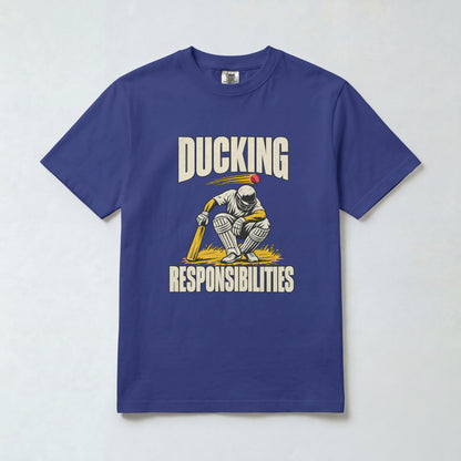 Royal Blue Ducking Responsibilities cricket t-shirt, front view with crouching batsman graphic