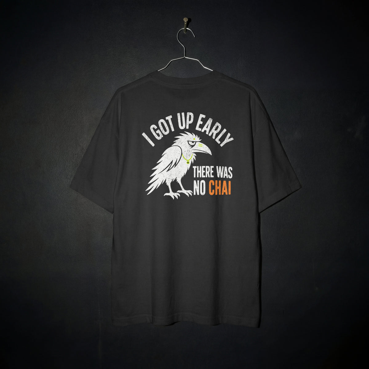 Black Early Bird No Chai funny chai oversized t-shirt flat on a hanger