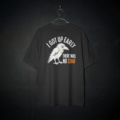 Black Early Bird No Chai funny chai oversized t-shirt flat on a hanger