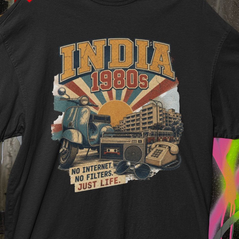 Close-up of the INDIA 1980s print on the Black oversized t-shirt – scooter, cassette player, landline phone and No Internet No Filters Just Life slogan